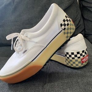 Double stacked white platform Vans